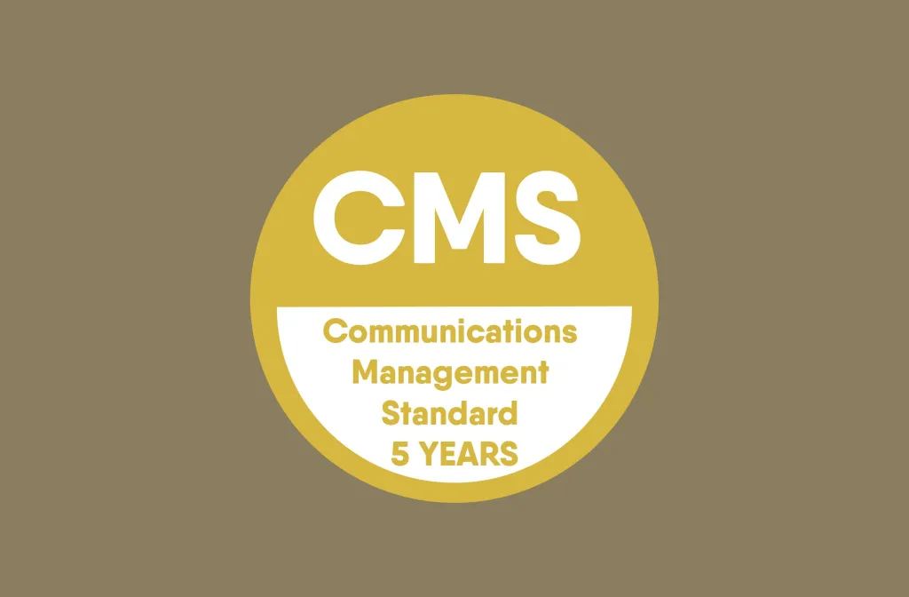 CMS Gold award badge for Communications Management Standard, valid for 5 years, displayed on a tan background.