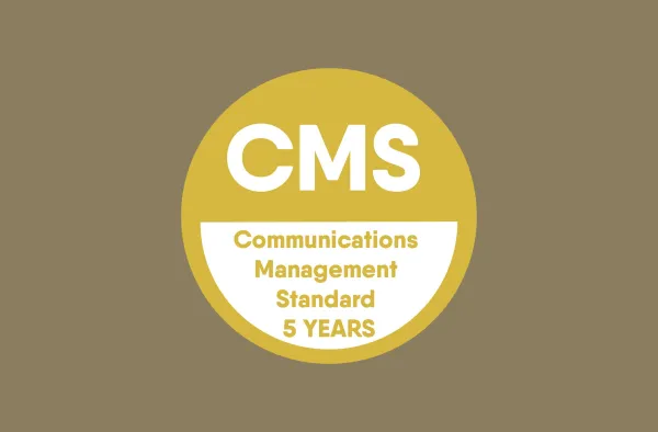 CMS Gold award badge for Communications Management Standard, valid for 5 years, displayed on a tan background.