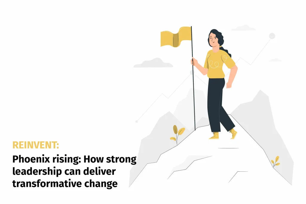 A woman in a yellow shirt stands on a mountain peak holding a gold flag, representing leadership and achievement in driving transformative organizational change.