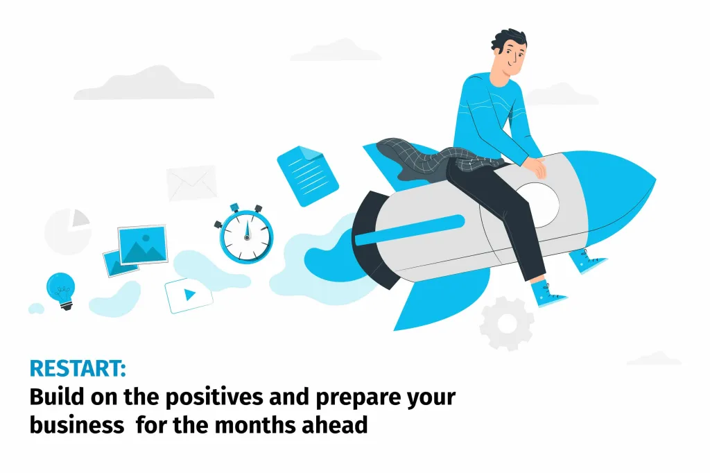 A man in a blue shirt sits atop a large rocket ship, holding a laptop while surrounded by business productivity icons including a clock, documents, and a lightbulb, symbolizing business growth and forward momentum during recovery.