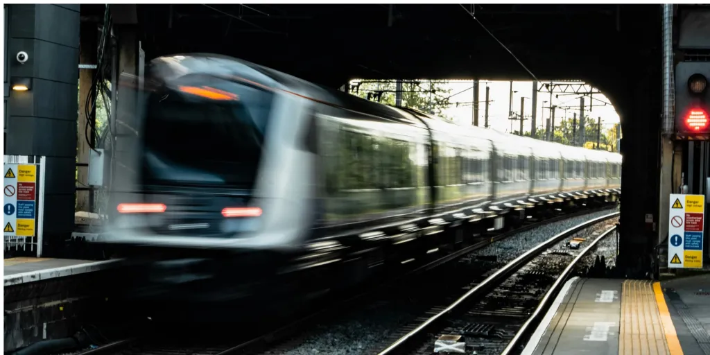 Picture of a blurry train on train tracks